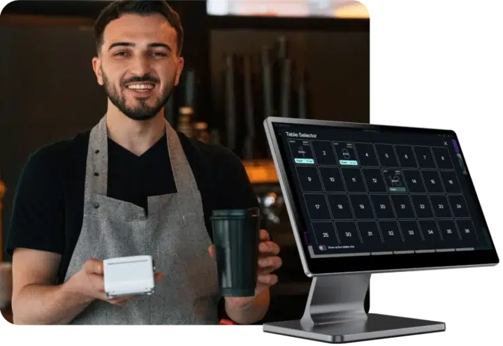 Smiling vendor holding a mobile pos device